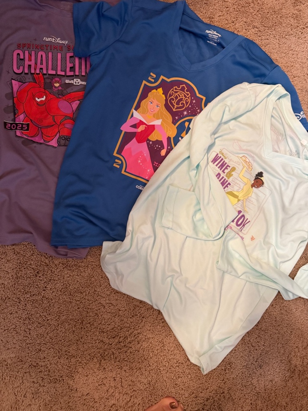 3 ladies size medium Disney race shirts